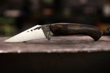 the rogue with black palm handle